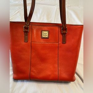 Dooney purse. Gently used. Some wear on the straps.